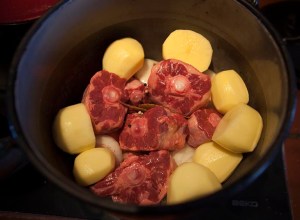 It's essential to use waxy spuds which won't disintegrate during the long cooking 